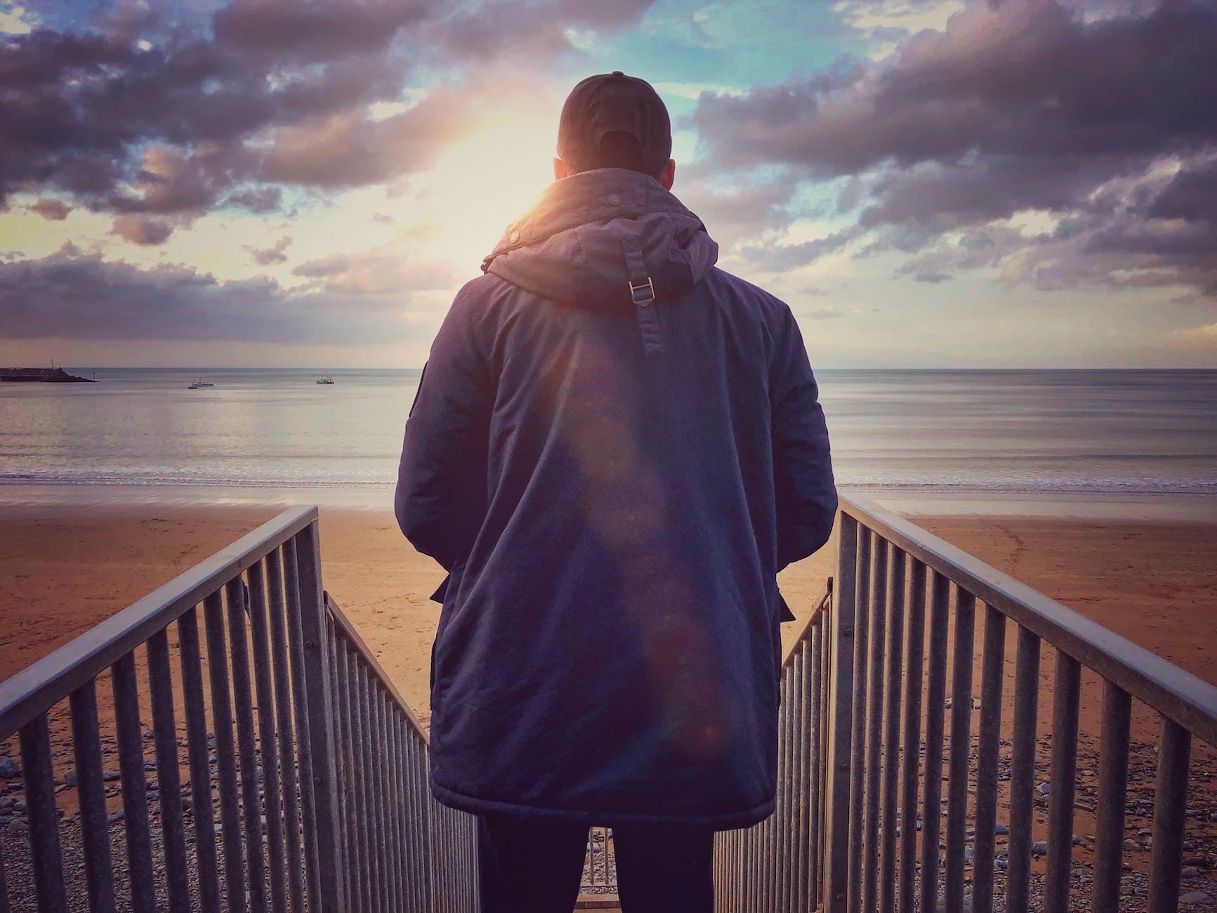 man standing on stairs