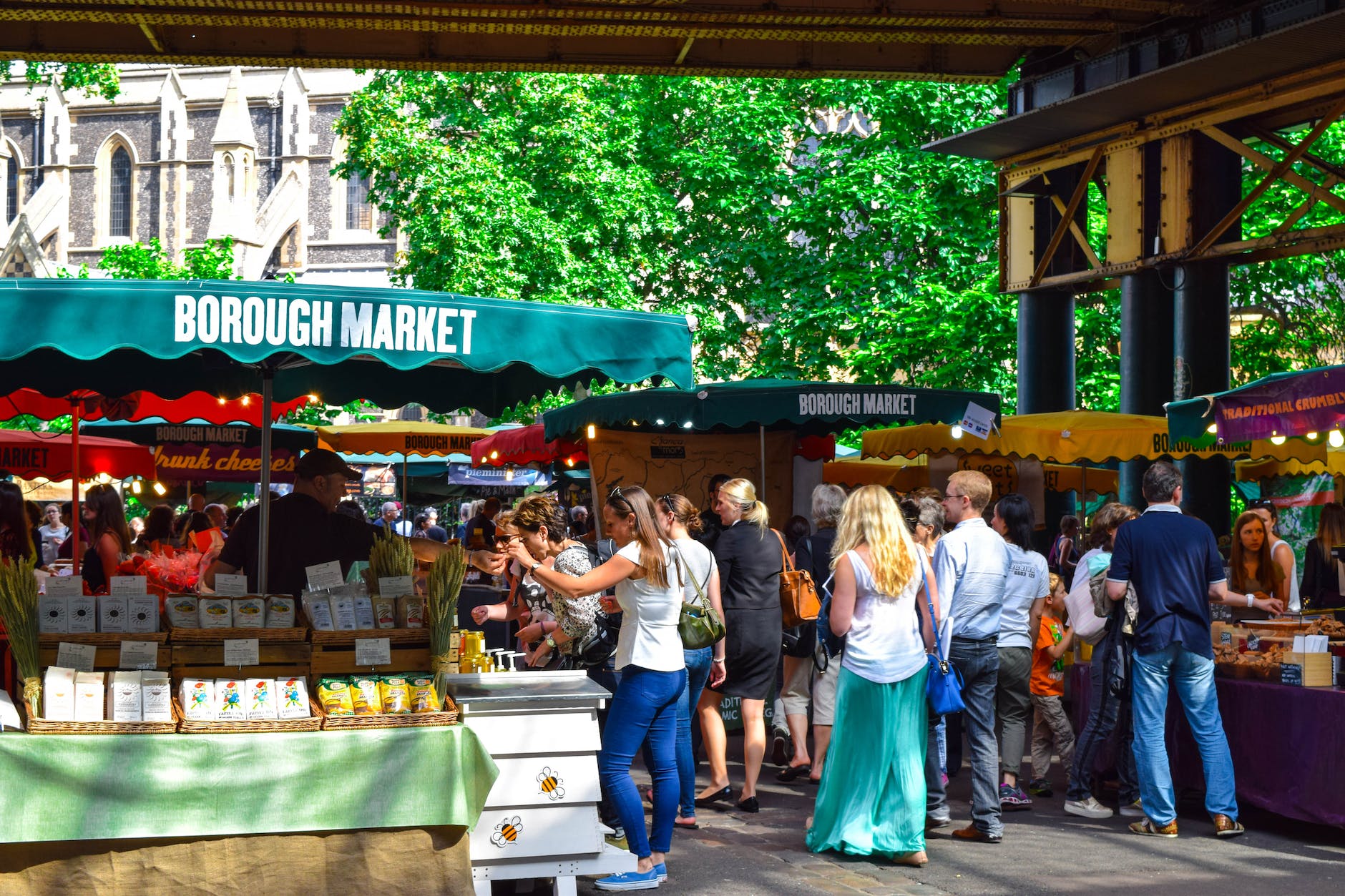 people walking in market