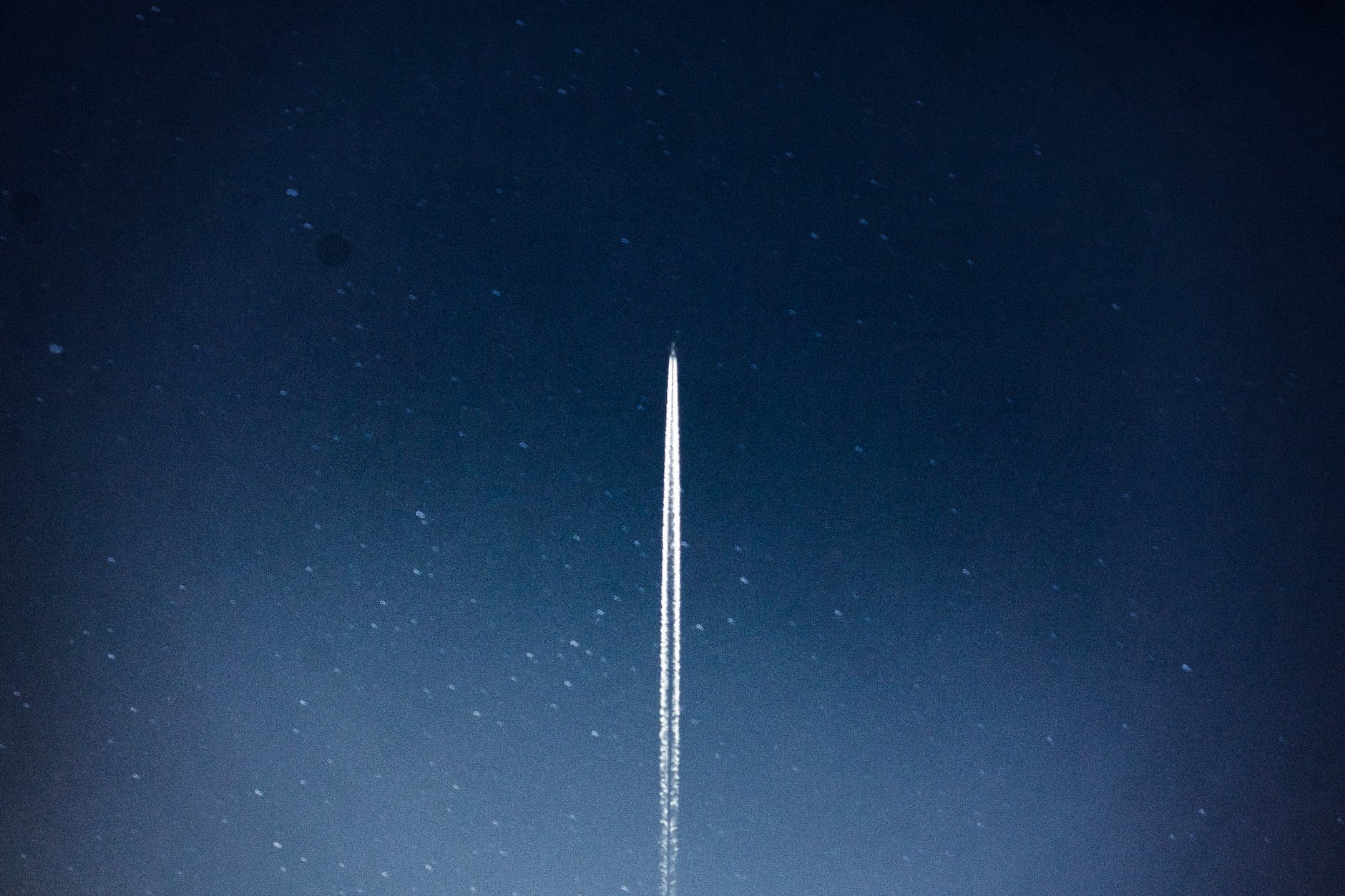 space shuttle launch during nighttime